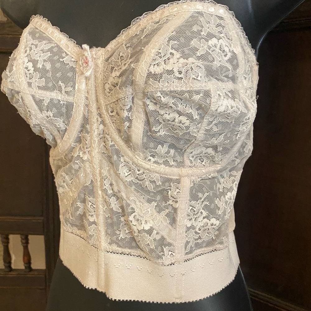 Vintage 1950’s lace corset manufactured by Surprise.  Semi-sheer, 40B